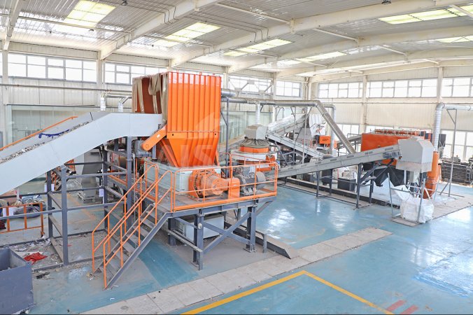 Planta trituradora de doble eje aplicada en un proyecto de eliminación de residuos textiles en Henan, China